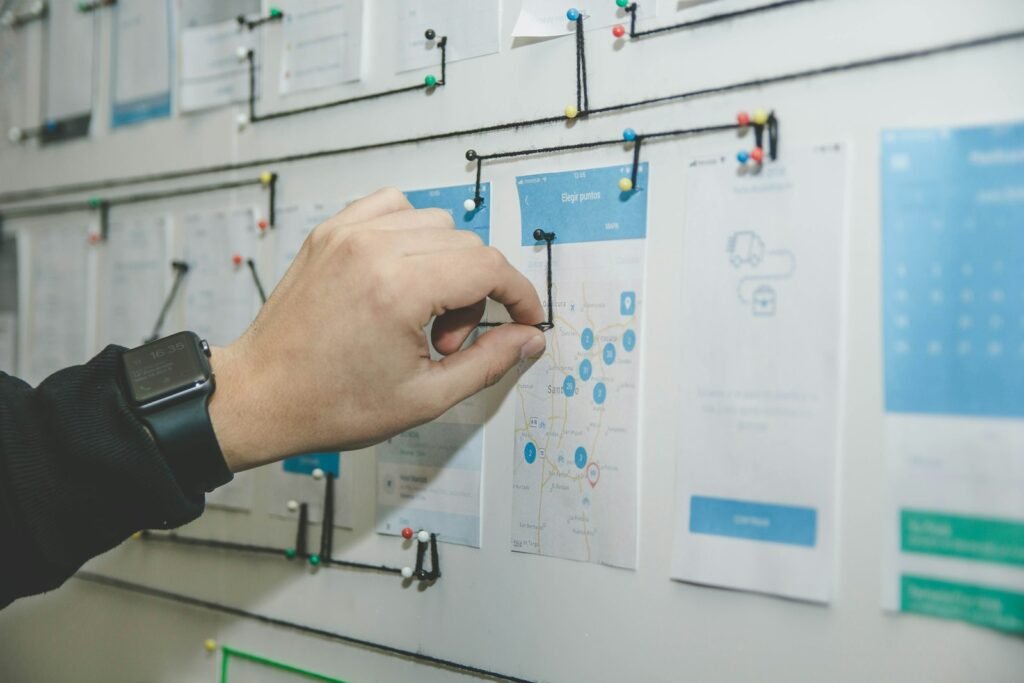 Website wireframes being sketched for a new layout